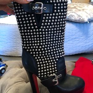 Louboutin studded boots. Make me an offer.